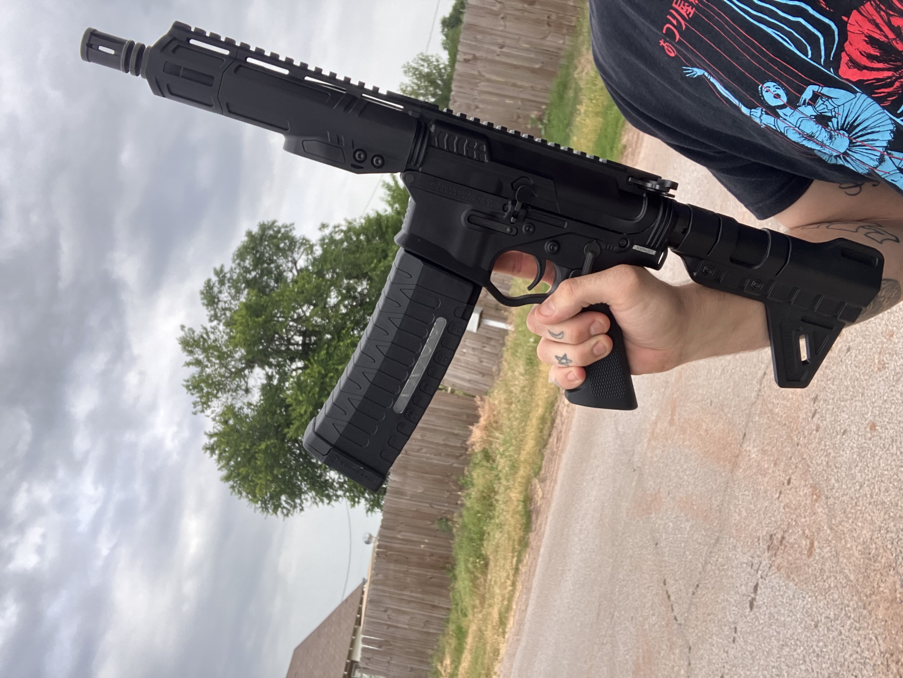 A real photo of ATI ALPHA MAXX AR Pistol 5.56 NATO 7.5" Barrel Blade 60rd Black by Az flacco (1)