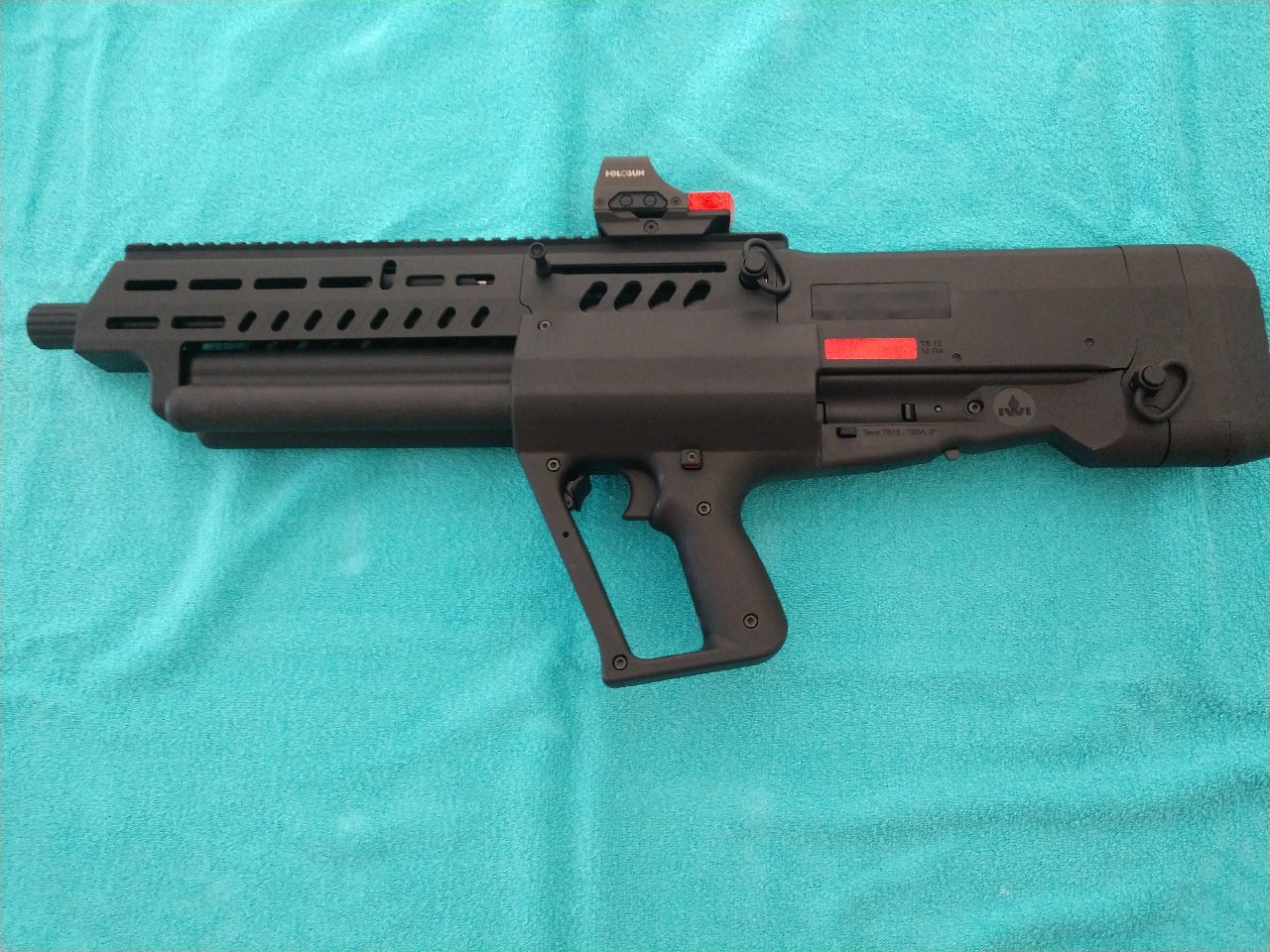 A real photo of IWI Tavor TS12 12GA Shotgun - 18.5" Barrel, 15rd Black Bullpup by GMO (1)